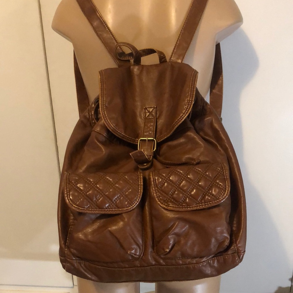 T-Shirt & Jeans. brown color Lovely Backpack